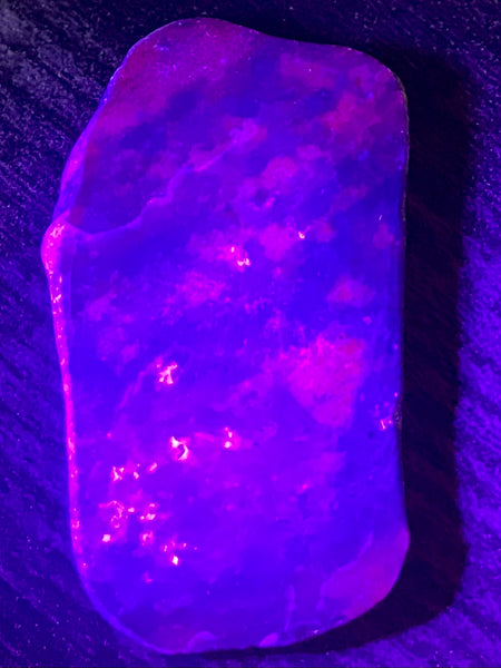 Fluorescent Ruby Corundum Palm Stone - Morganna’s Treasures 