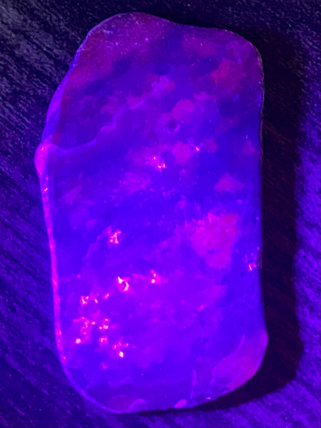 Fluorescent Ruby Corundum Palm Stone - Morganna’s Treasures 