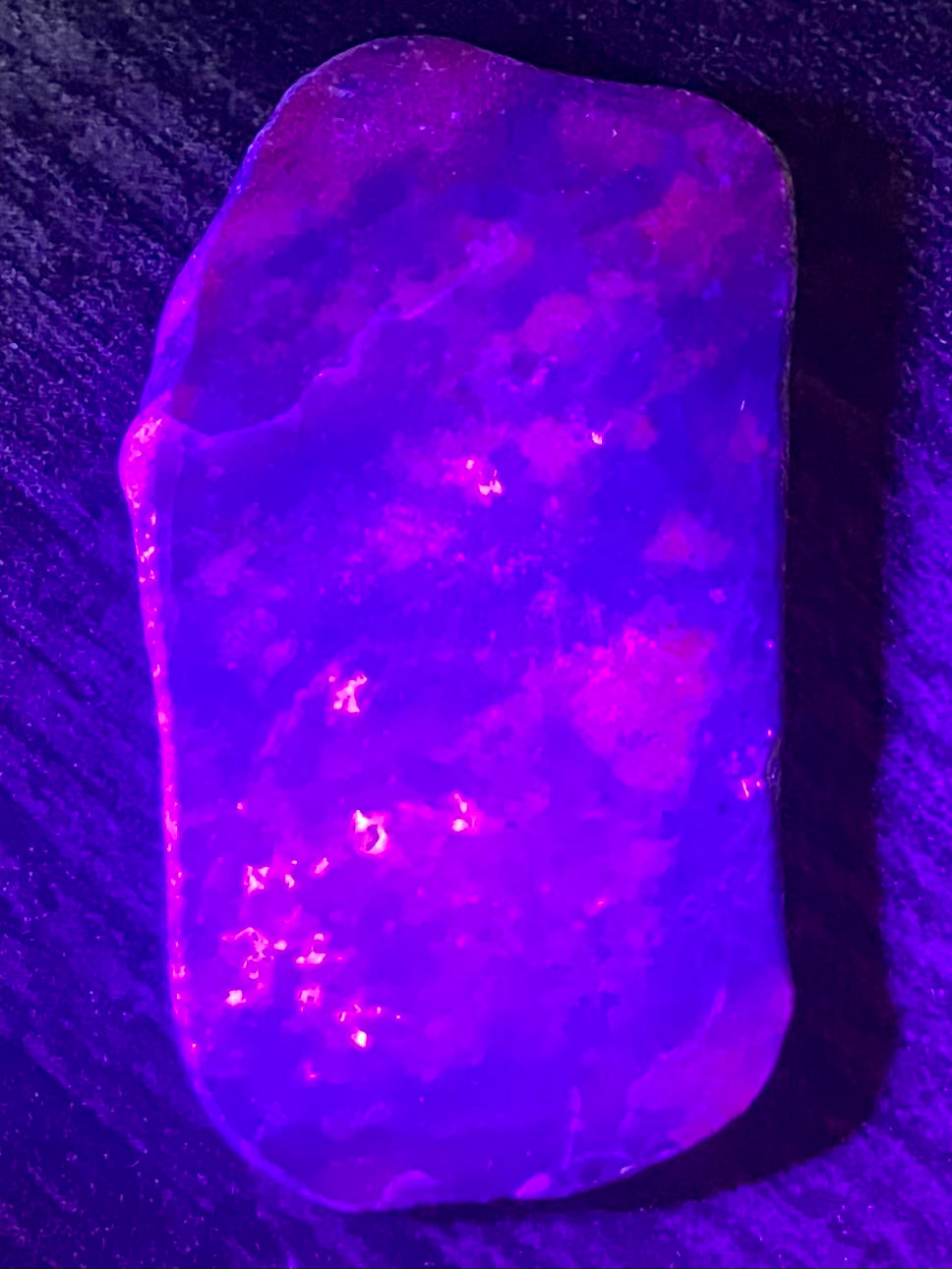 Fluorescent Ruby Corundum Palm Stone - Morganna’s Treasures 