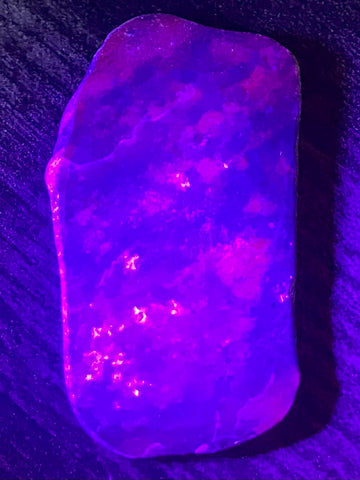 Fluorescent Ruby Corundum Palm Stone - Morganna’s Treasures 