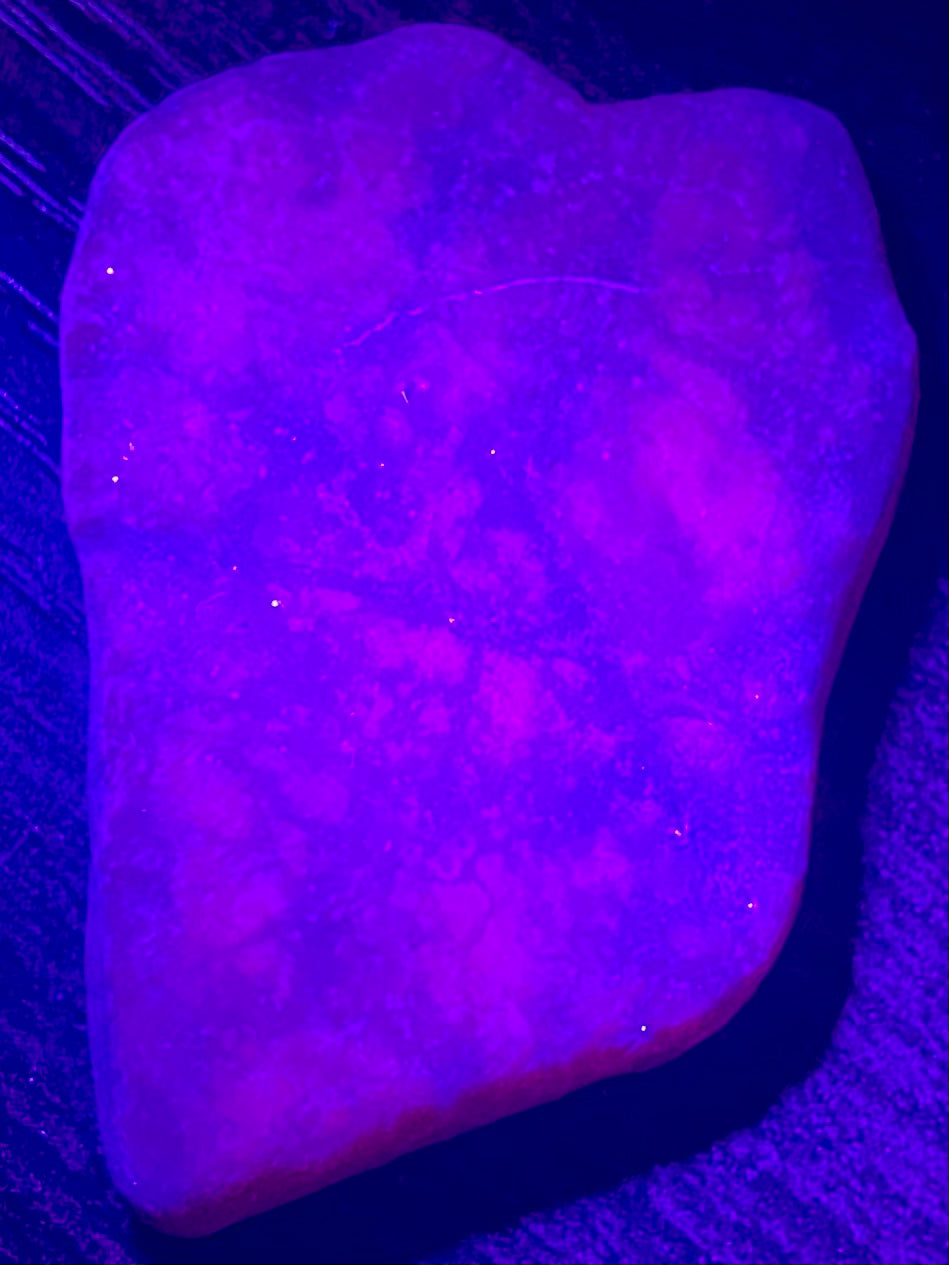 Fluorescent Ruby Corundum Palm Stone - Morganna’s Treasures 