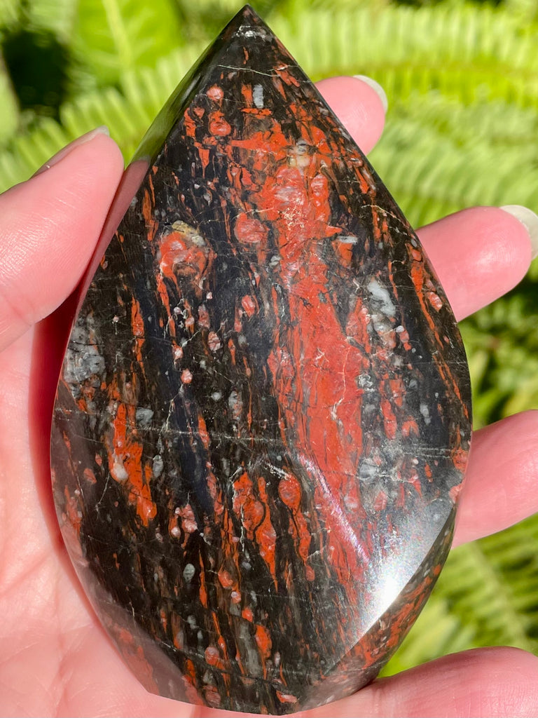 Black tourmaline with red outlet hematite