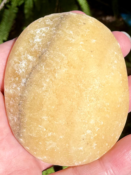 Large Rough Orange Calcite Palm Stone - Morganna’s Treasures