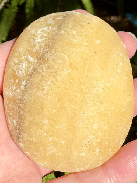Large Rough Orange Calcite Palm Stone - Morganna’s Treasures