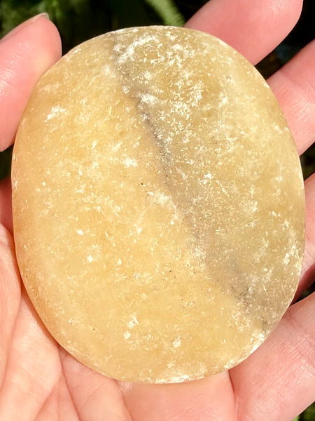 Large Rough Orange Calcite Palm Stone - Morganna’s Treasures
