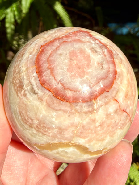 Beautiful Red Calcite Sphere - Morganna’s Treasures
