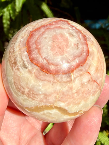 Beautiful Red Calcite Sphere - Morganna’s Treasures