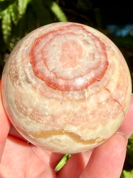 Beautiful Red Calcite Sphere - Morganna’s Treasures
