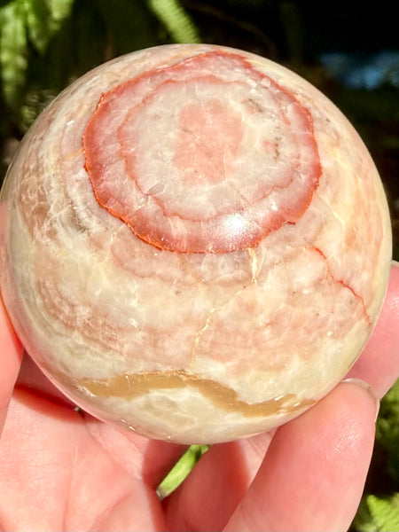 Beautiful Red Calcite Sphere - Morganna’s Treasures
