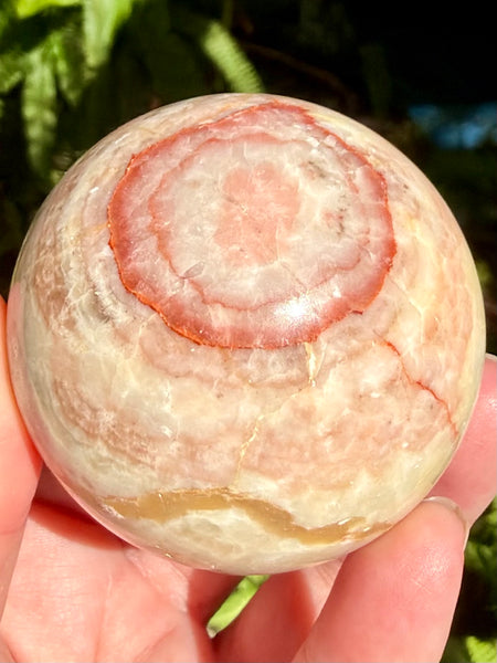 Beautiful Red Calcite Sphere - Morganna’s Treasures