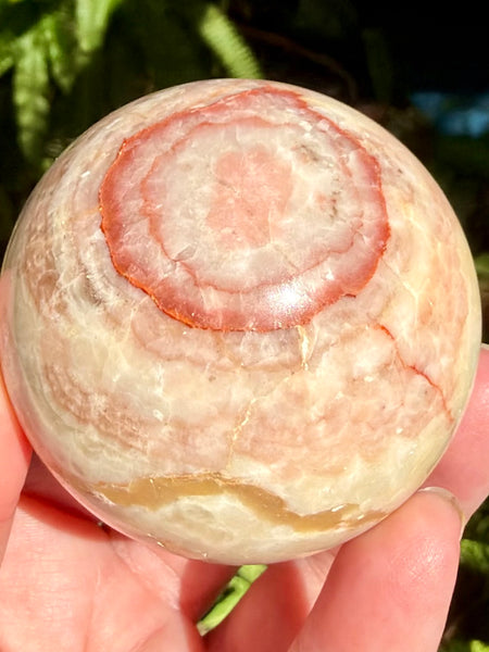 Beautiful Red Calcite Sphere - Morganna’s Treasures