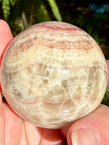 Beautiful Red Calcite Sphere - Morganna’s Treasures